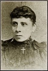 Head and shoulders photo of H. Cordelia Ray looking left, a cross around neck.