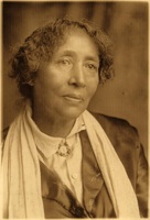 Lucy Eldine Gonzalez Parsons facing right.