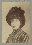 Head and shoulders photo of Lucy Parsons looking front.
