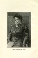 3/4 body photo of Leila Amos Pendleton seated and facing front. She is holding a book.