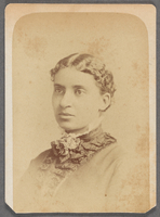 Charlotte Forten Grimké looking left.