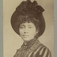 Head and shoulders photo of Lucy Parsons looking front.