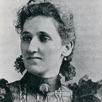 Head and neck photo of Victoria Earle Matthews looking left.