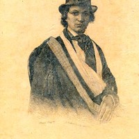 Ellen Craft wearing the attire of a man: top hat, jacket, ascot, plus a sling and glasses.