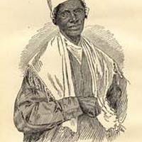 Sojourner Truth facing front with her left fist on her waist. 