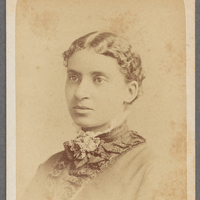 Charlotte Forten Grimké looking left.