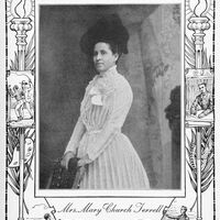 3/4 body photo of Mary Church Terrell standing and facing left. 