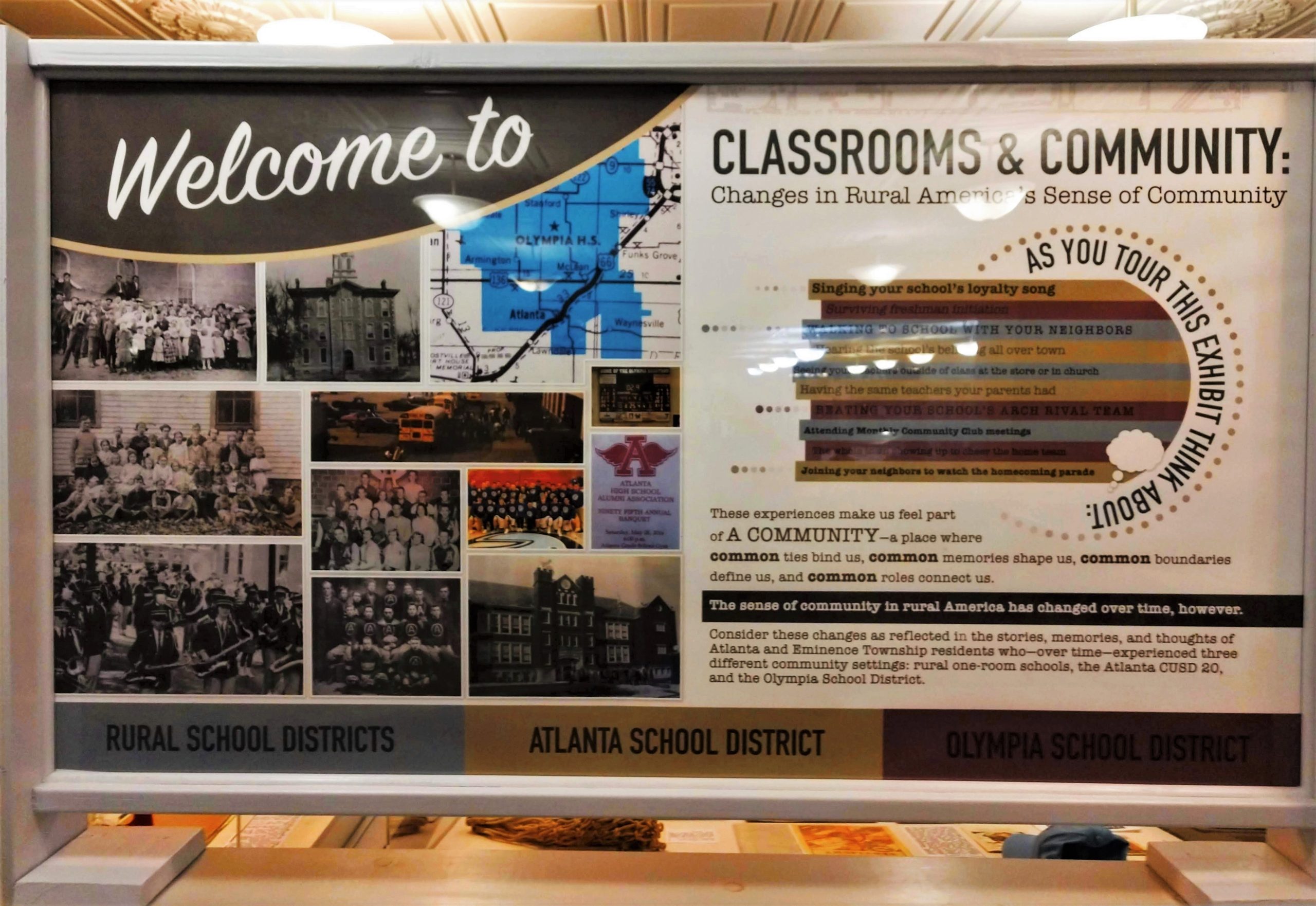 Photograph of a sign welcoming visitors to Atlanta Museum's companion exhibition, "Classrooms & Community".