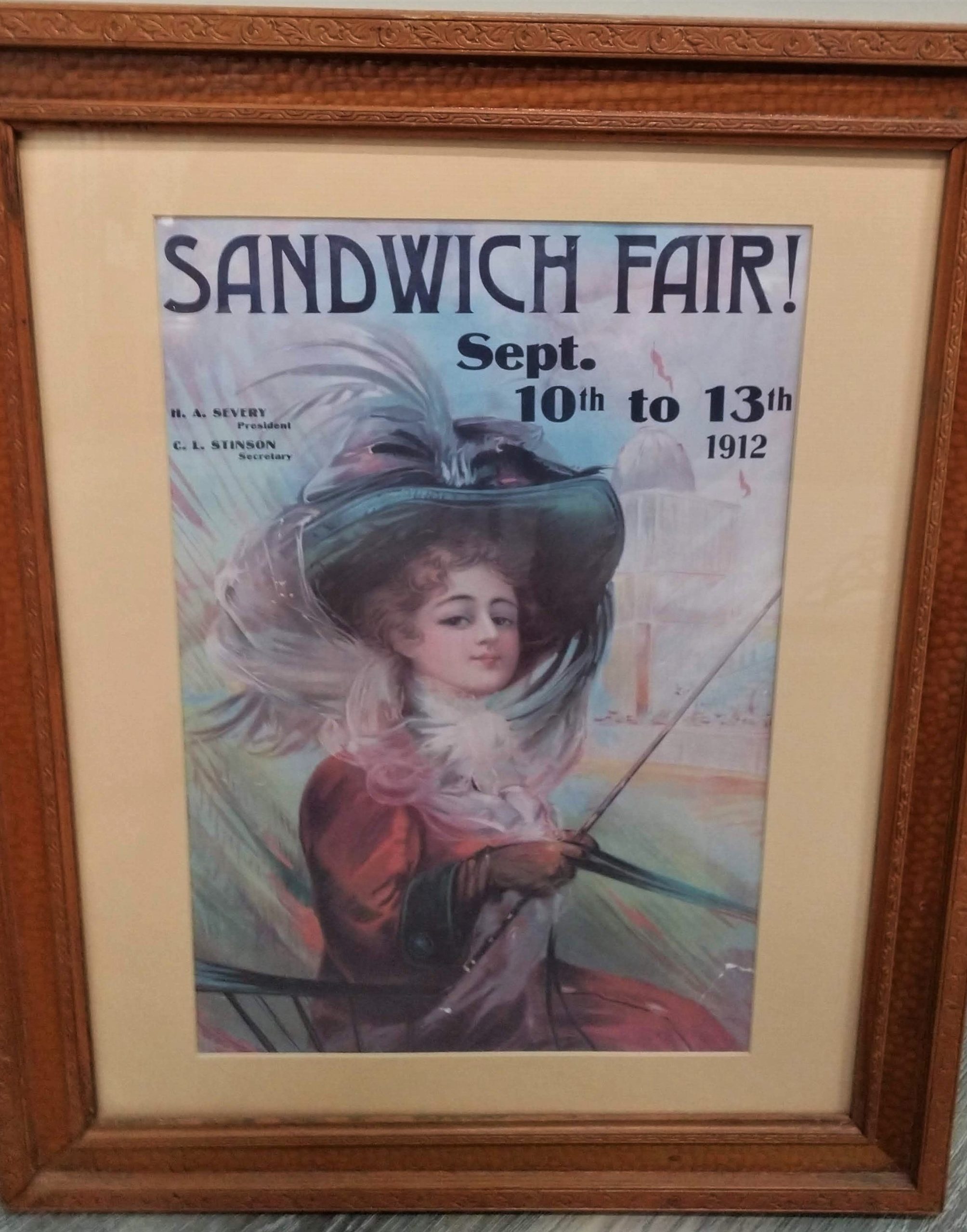 Photograph of poster advertising the 1912 Sandwich Fair.