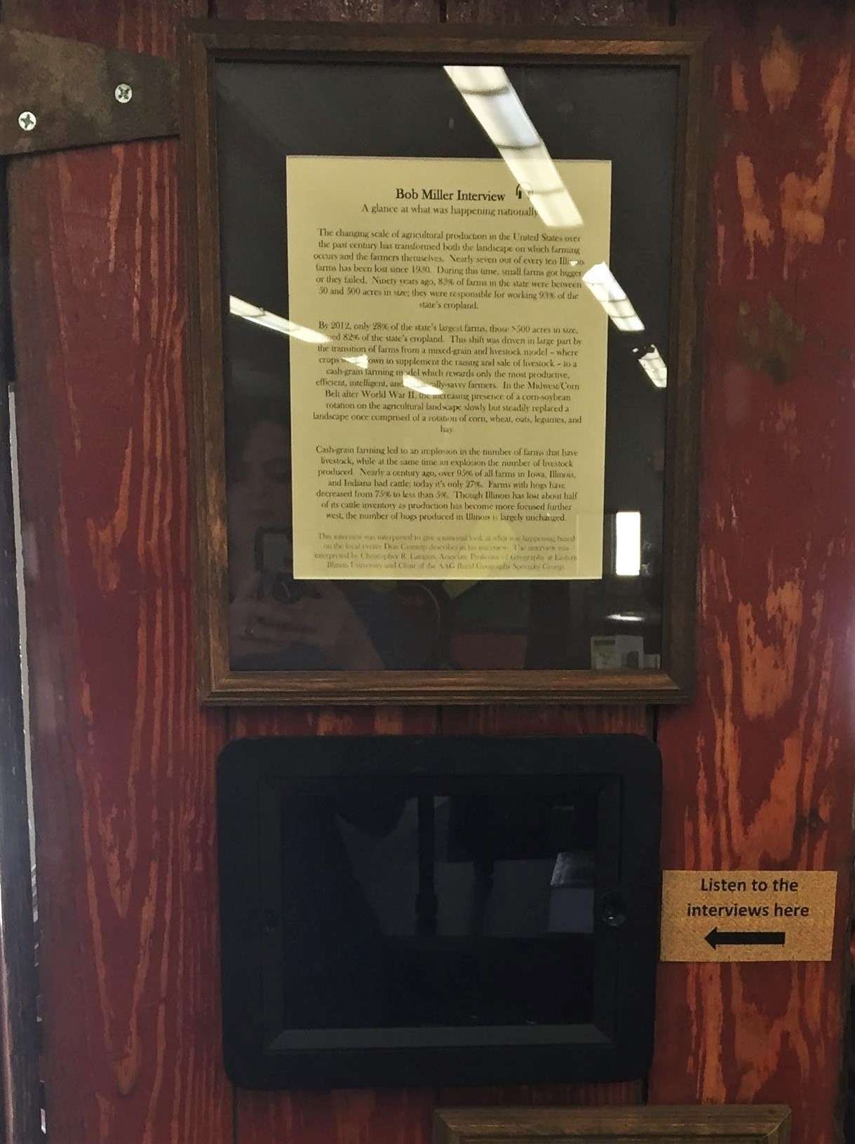 Photograph of a segment of Marshall Public Library's companion exhibition featuring interviews with farmers and commentary by a geographer.