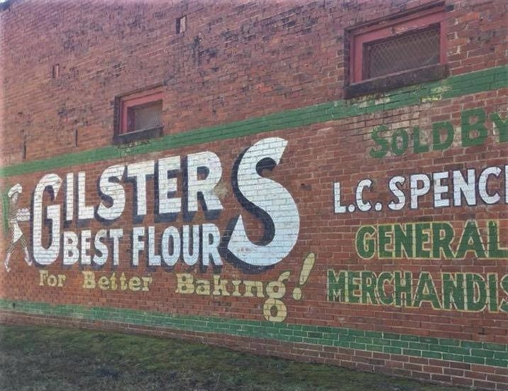 Photograph of a painted advertisement for Gilster's Best Flour in McCarley, Mississippi.