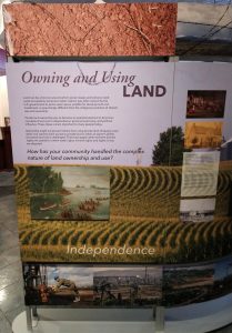 Photograph of a portion of the "Land" segment of Crossroads, including text and images.