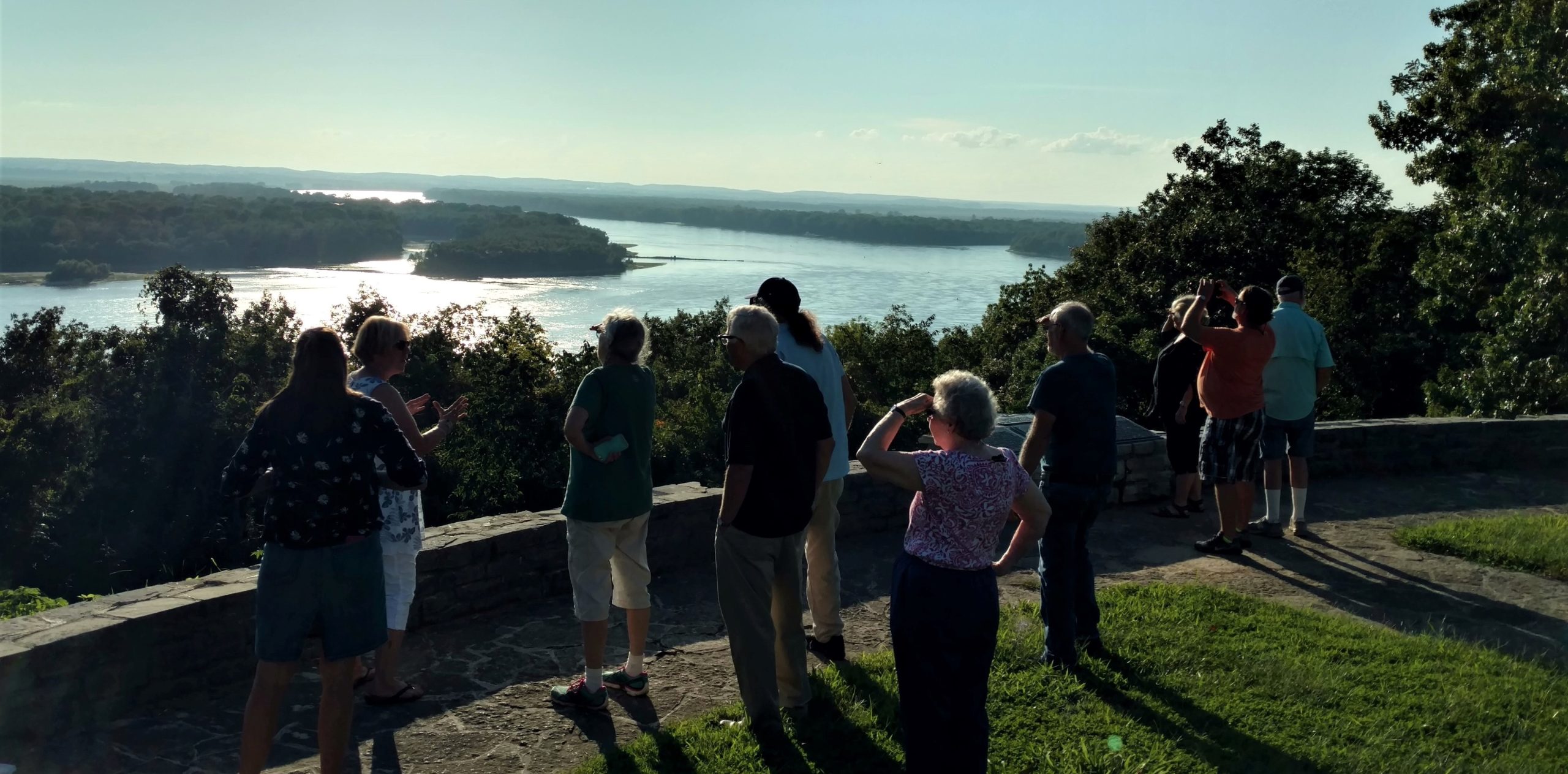 Photograph of ten people viewing the Mississippi River from Fort Kaskaskia State Historic Site.