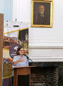 Photograph of historian and Crossroads curator Debra Reid speaking at Chester Public Library.