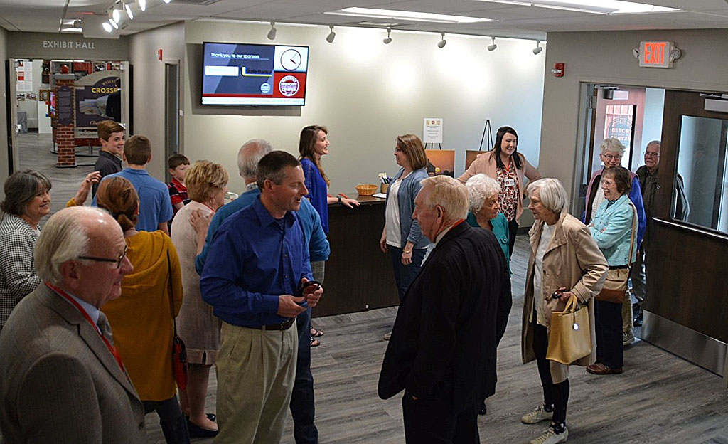 Photograph of visitors in the newly opened main building of DeKalb County History Center.