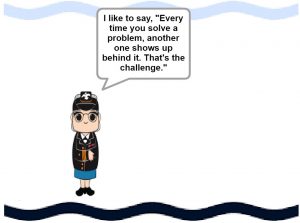 An illustrated Grace Hopper on a white background. Above her head is a speech bubble with the text, "I like to say, 'Every time you solve a problem, another one shows up behind it. That's the challenge.'"