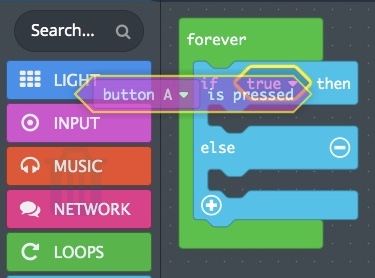 A 'Button A is pressed' block is dragged from the INPUT category to the block code workspace, into the 'If… Then… Else' block.