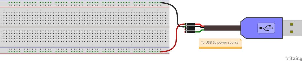 Breadboard connected to 5 volt and ground of TTL to USB cable