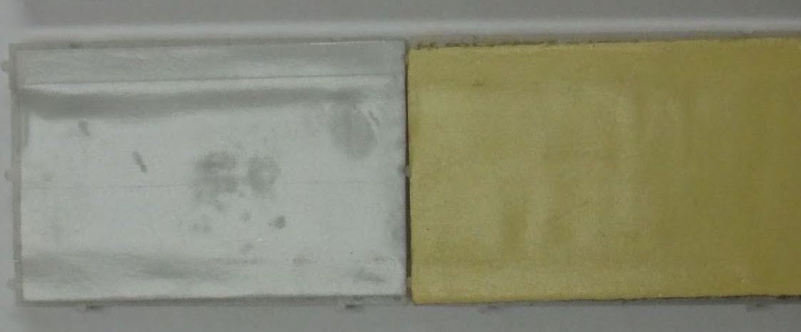 The bottom of a typical breadboard, which has a protective, sticky covering.